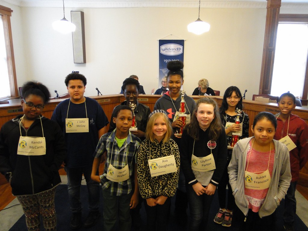 Spelling Bee Participants with Name Tags around their necks