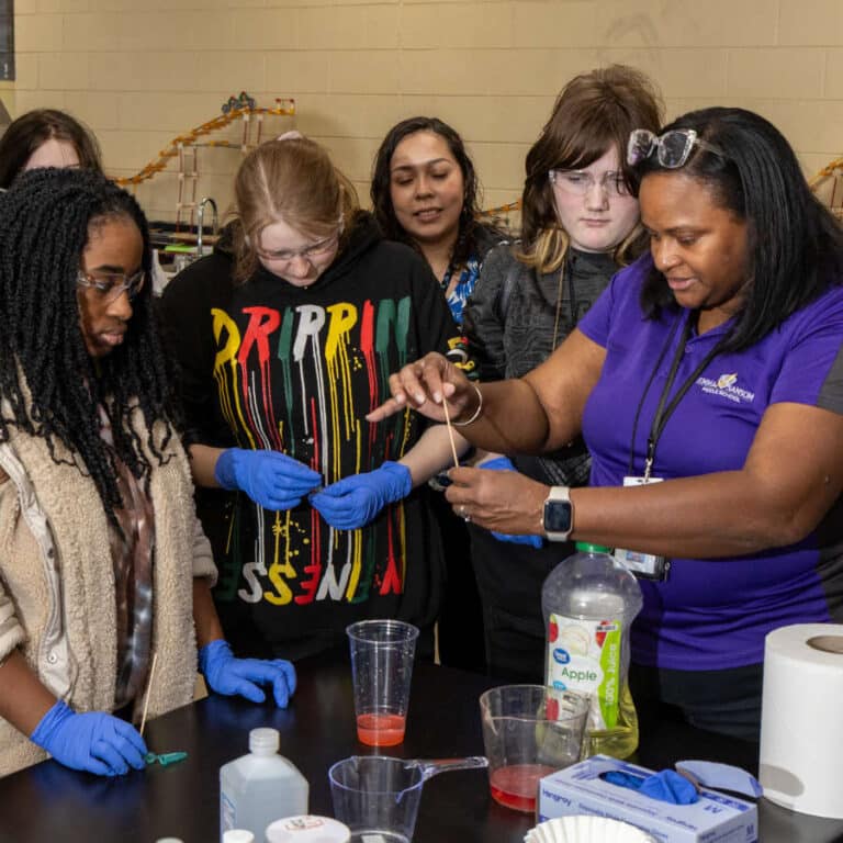 teacher-showing-experiment